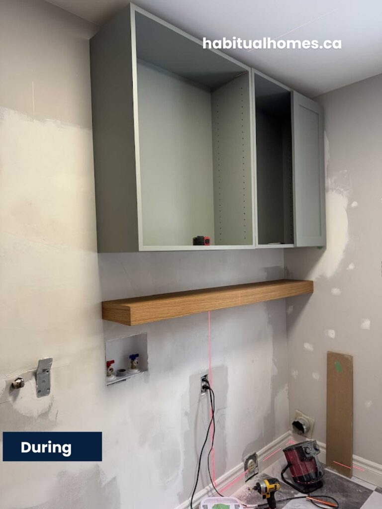 installing-cabinets-laundry-remodel.jpg