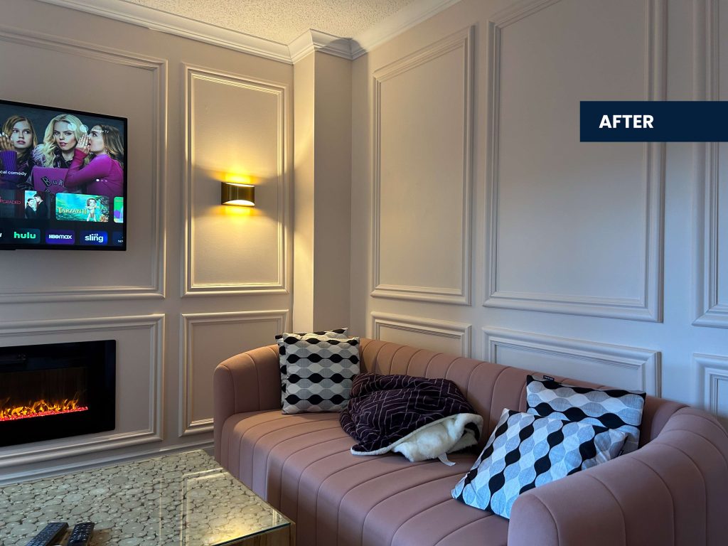 Electric fireplace, sconces, wainscoting