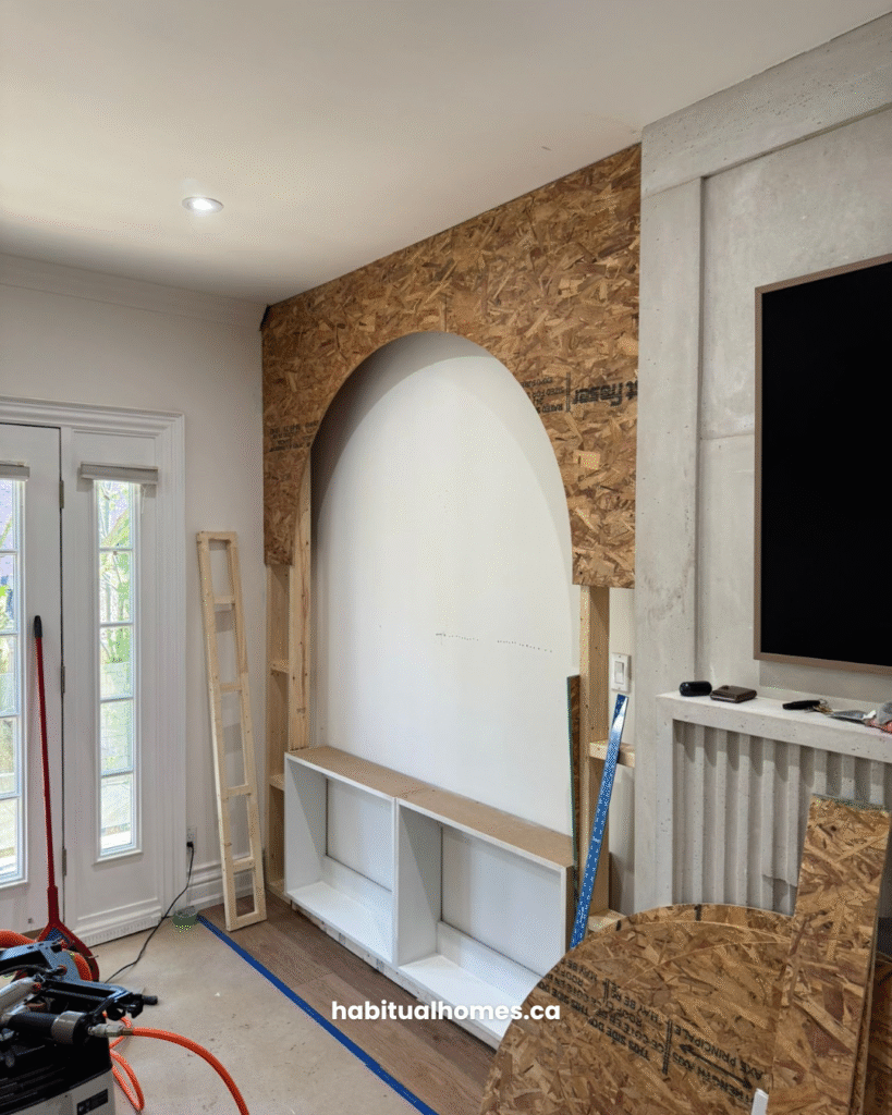habitual-homes-feature-wall-arch-shelving-north-york-08.jpg