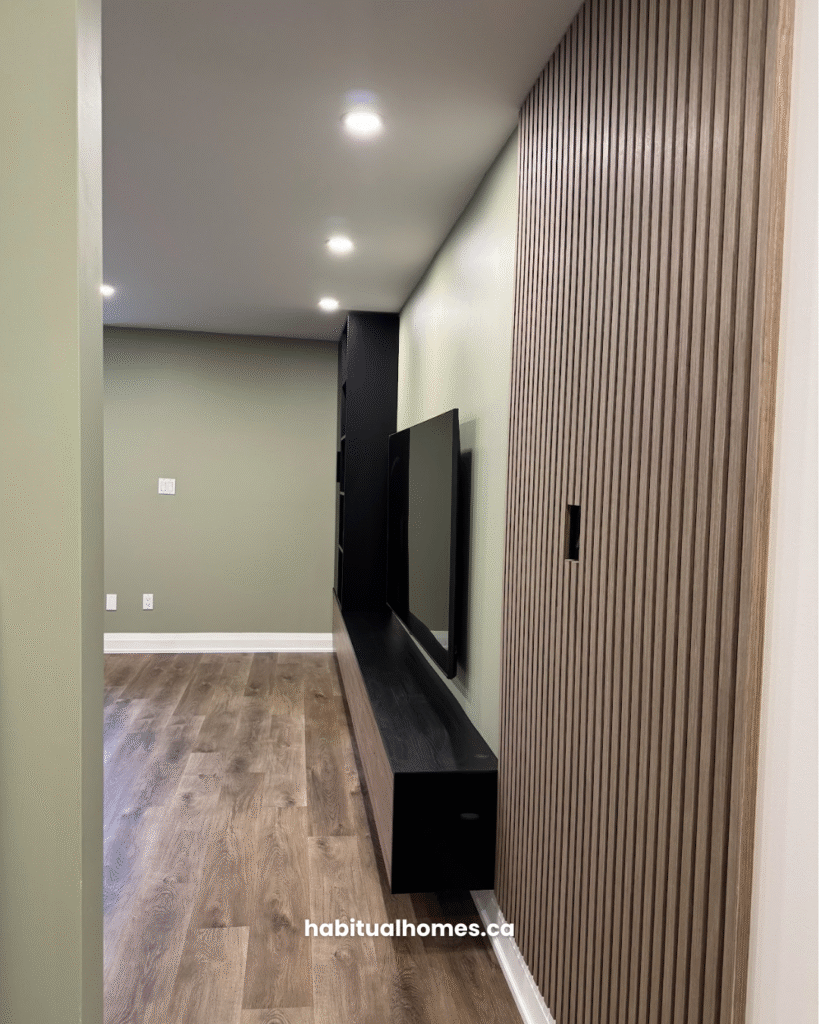 habitual-homes-media-wall-black-shelving-carleton-village-toronto-06.jpg