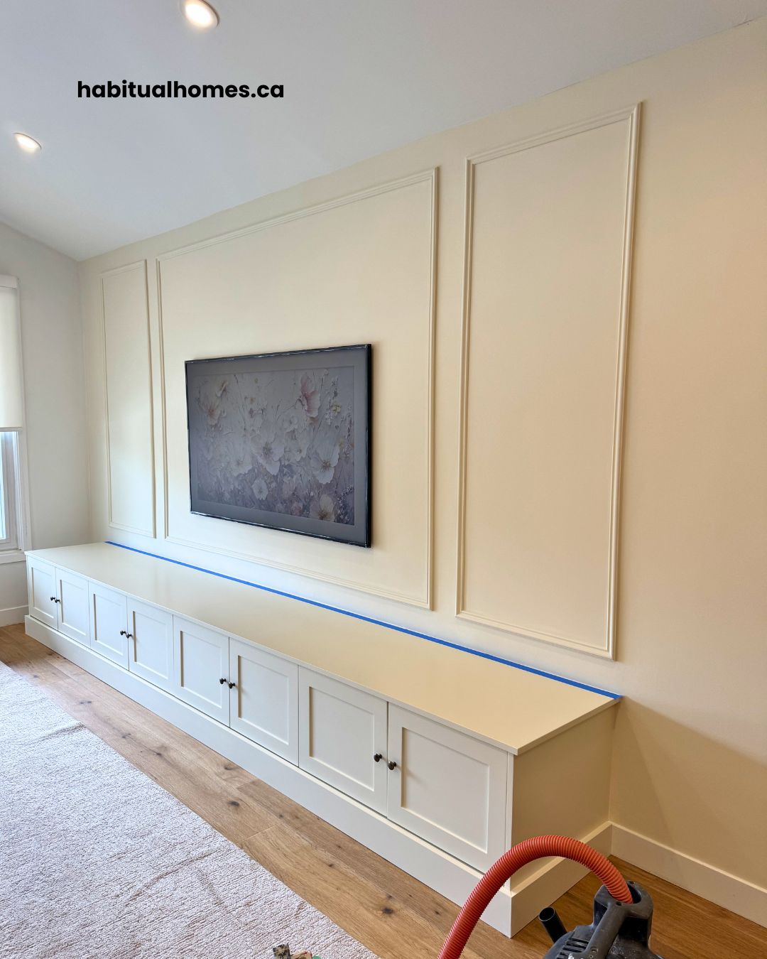 Finished custom TV wall built on a solid brick wall in Toronto